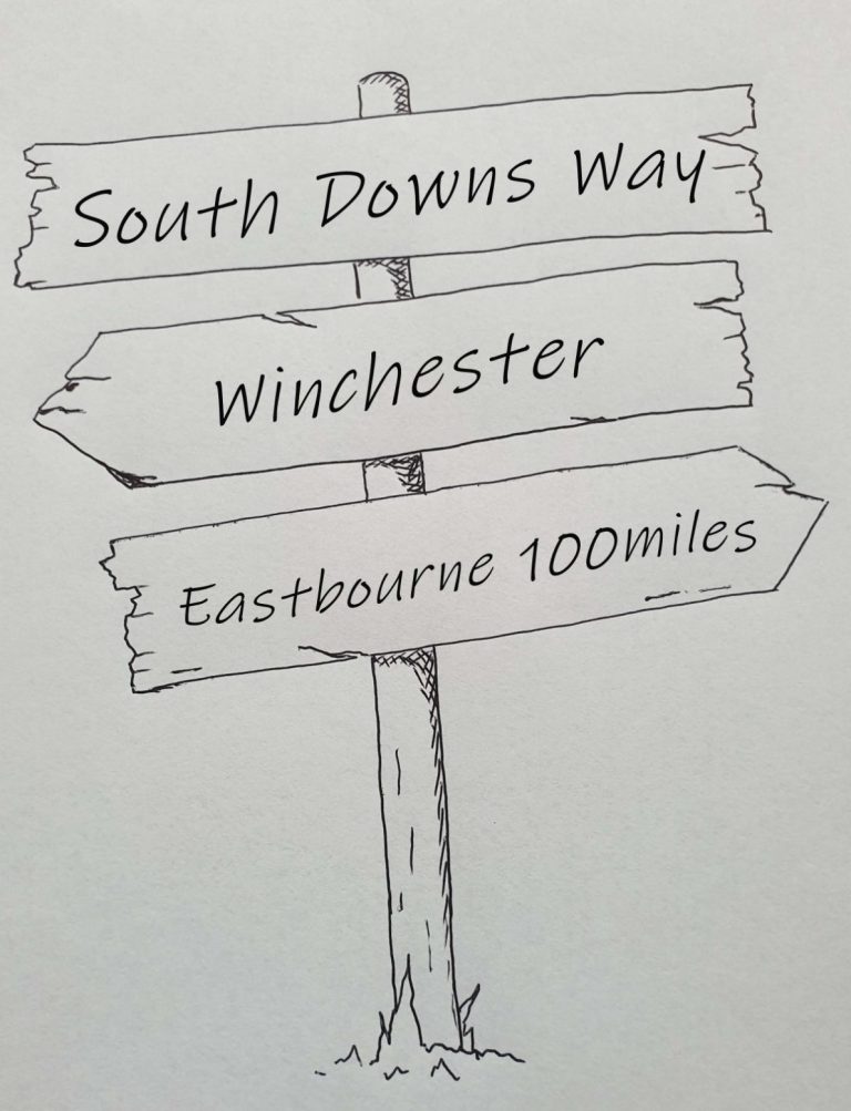 Hand drawn sign post showing the South Downs Way full path