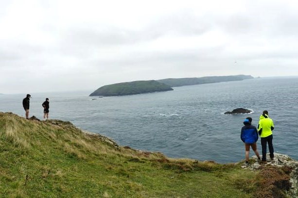 Walkers looking out to sea 