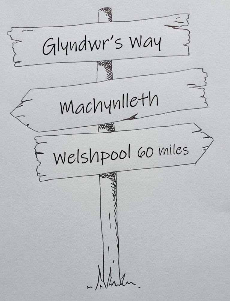 Hand drawn sign post showing Glyndwr's Way Machynlleth to Welshpool 60 miles