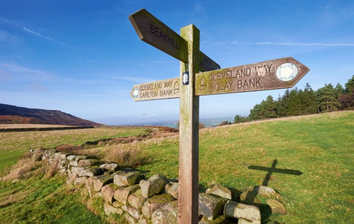 Wooden sign post of Cleveland Way