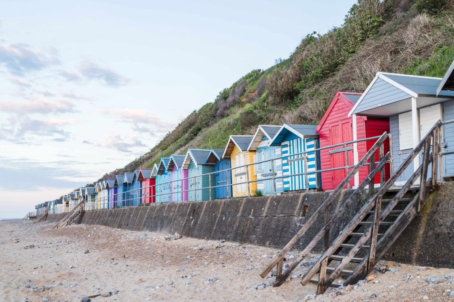 Colourful beach huts on the sea front at Cromer