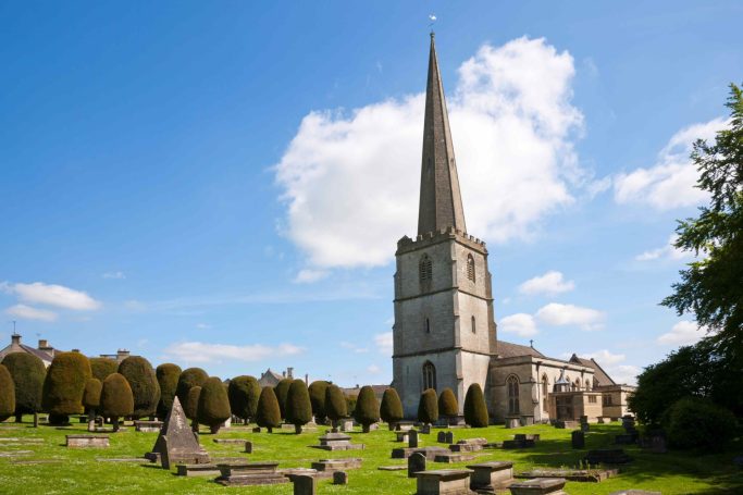 St Mary Church at Painswick with yew trees